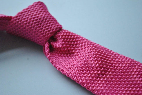 plain bright pink skinny knitted tie with pointed end